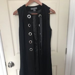 Long sleeveless vest with grommets